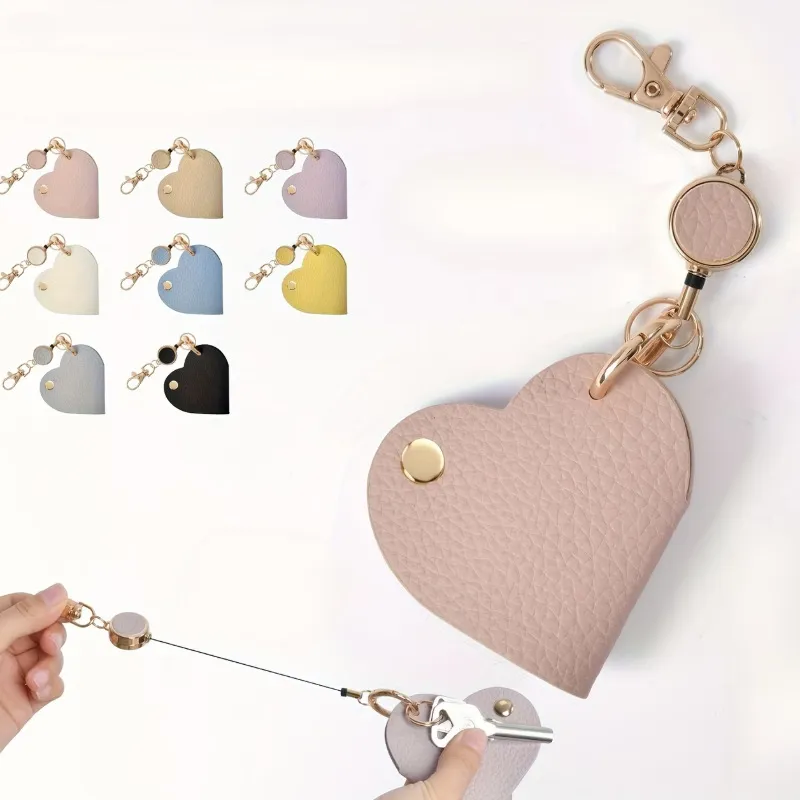 pu leather heart retractable key holder - trade show giveaway supplier